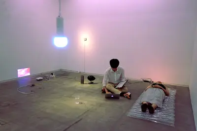 Nozomu performing inside the Immunotherapy installation